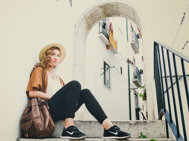 Lisbon Portugal Blog, Lisbon Portugal Photography, Best places to visit in Portugal, nike shoes, girl sitting on steps, Portugal girl on street